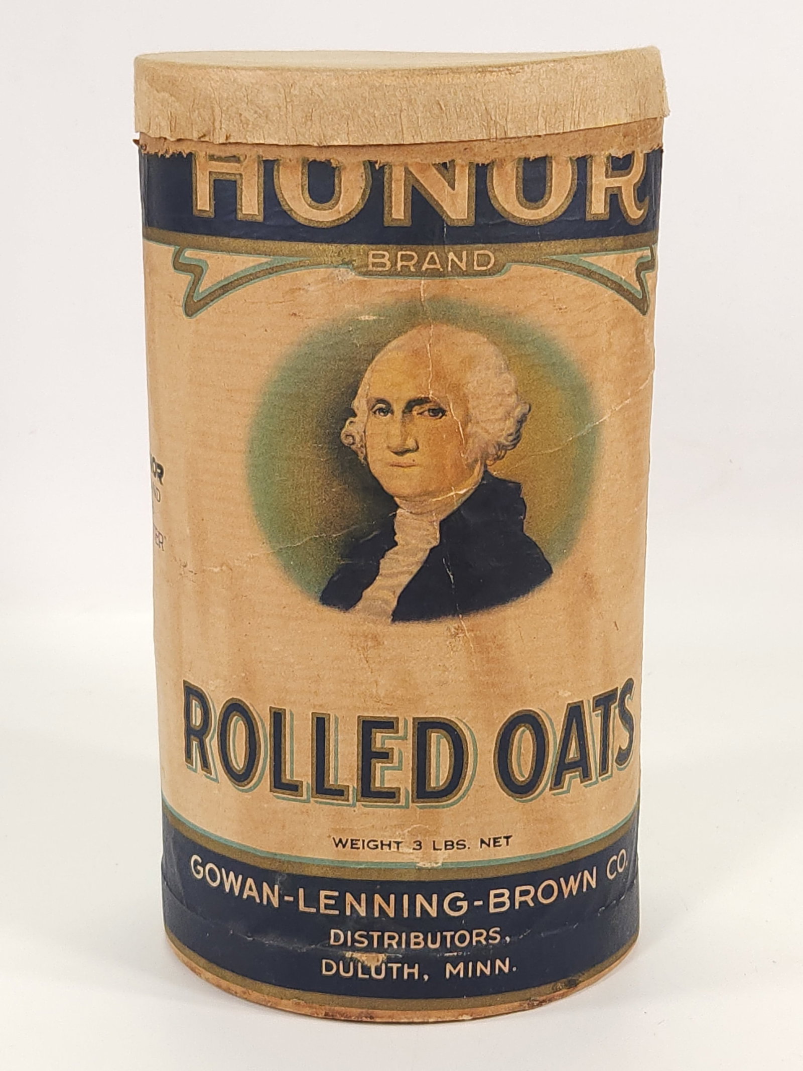HONOR GEORGE WASHINGTON ROLLED OATS CONTAINER: REMAINS IN GOOD CONDITION, SHOWING SOME TYPICAL WEAR.