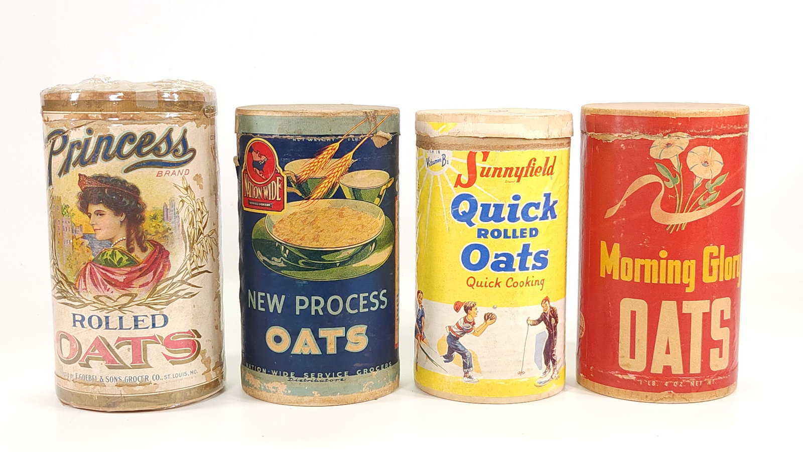 4) ANTIQUE OATS CONTAINERS (1 of 2)