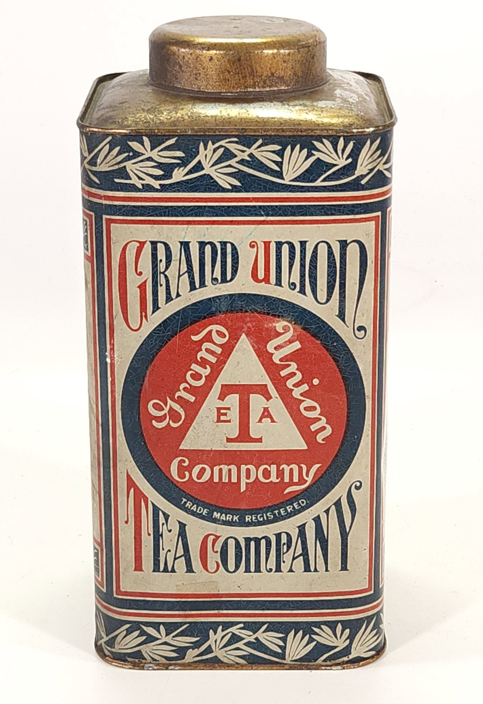 GRAND UNION TEA COMPANY ADVERTISING TIN: REMAINS IN GOOD CONDITION, SHOWING SOME TYPICAL WEAR.