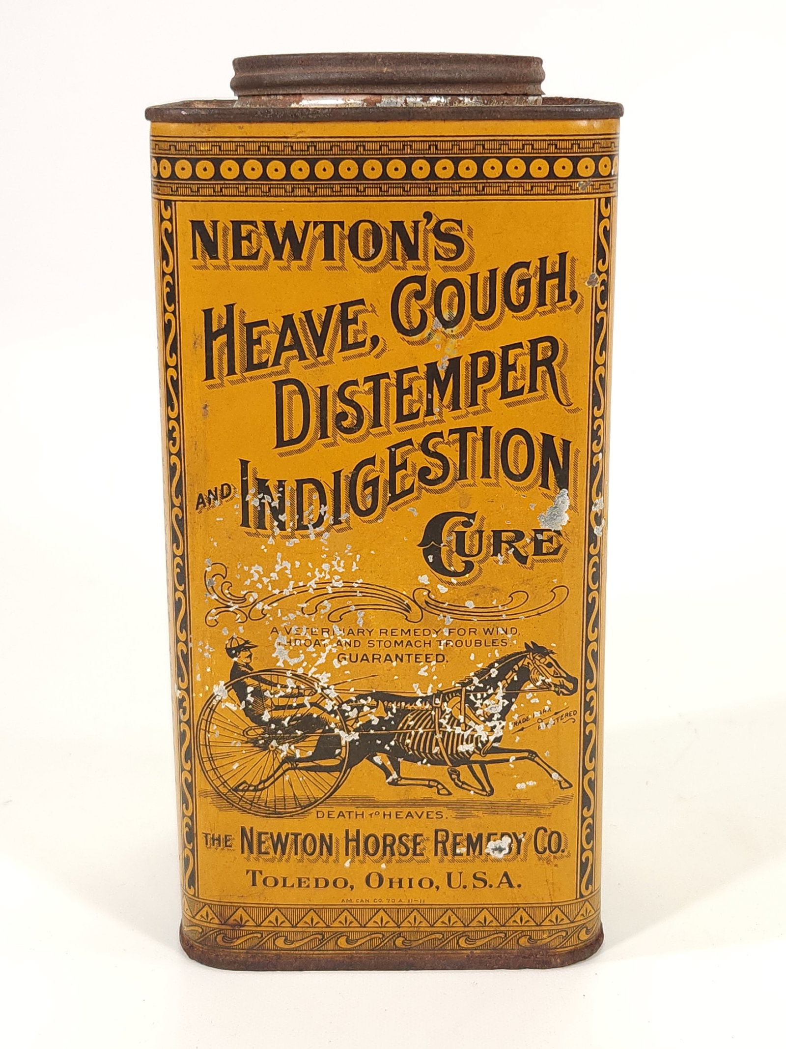 NEWTON HORSE REMEDY CO. HEAVE COUGH DISTEMPER CURE TIN: REMAINS IN FAIR TO GOOD CONDITION. GREAT IMAGE OF SULKY HORSE SHOWING ITS SKELETON.