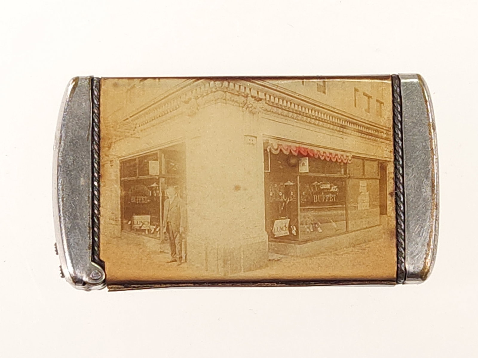 M.F. CURTIS BUFFET CHICAGO ADV. MATCH SAFE: REMAINS IN GOOD CONDITION, SHOWING SOME TYPICAL WEAR.
