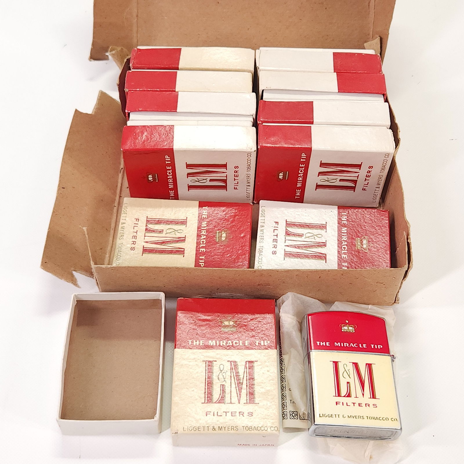 11) L&M CIGARETTE LIGHTERS UNUSED - PARTIAL CASE (1 of 3)