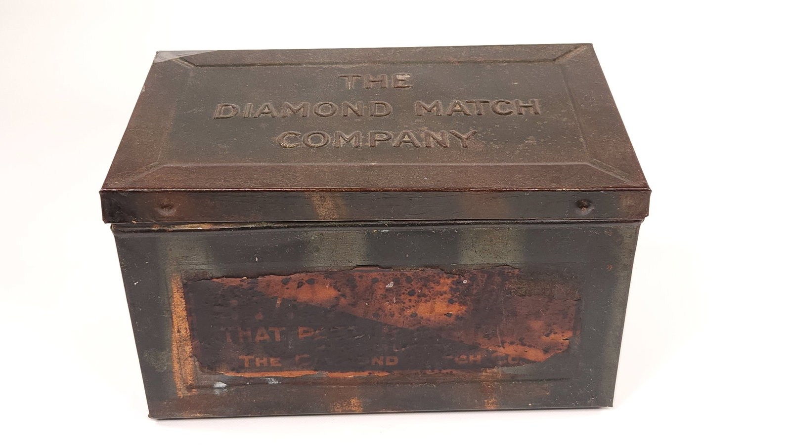 DIAMOND MATCH CO. TIN W/ PAPER LABEL: REMAINS IN POOR TO FAIR CONDITION SHOWING WEAR. LABEL UNABLE TO READ.