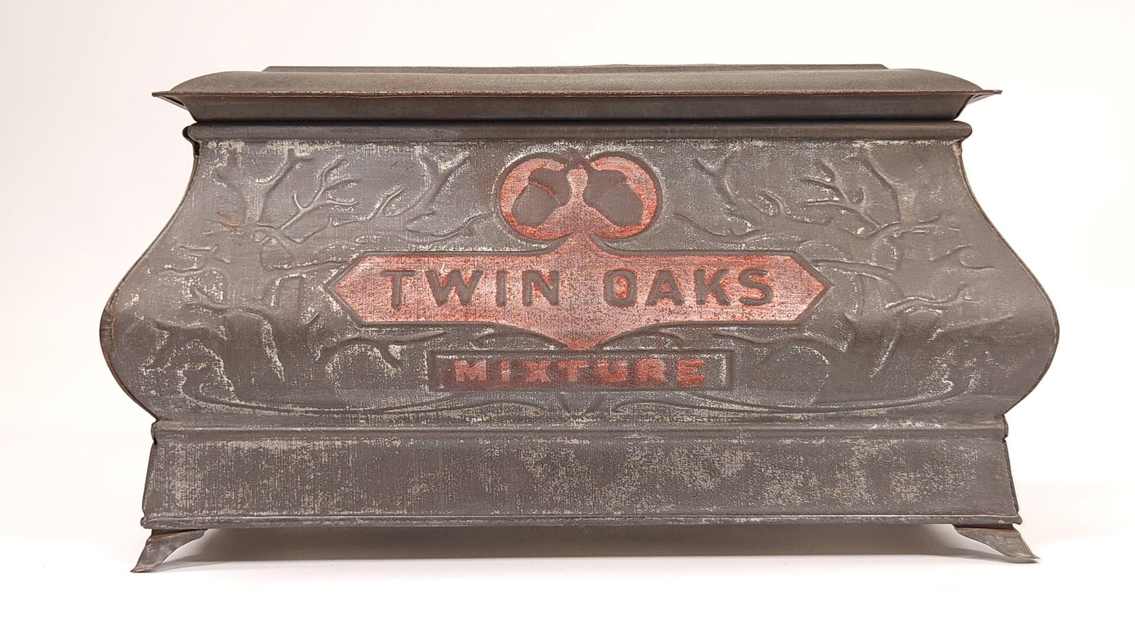 TIN OAKS MIXTURE CIGARETTE TOBACCO TIN: REMAINS IN FAIR TO GOOD CONDITION, SHOWING SOME TYPICAL WEAR.