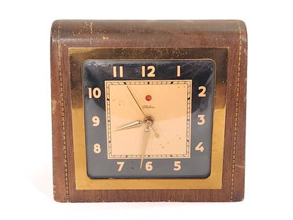 WOOD INLAID WARREN TELECHRON 4F61 ELECTRIC CLOCK: CLOCK REMAINS IN GOOD CONDITION WITH LIGHT GENERAL WEAR, DUST, HANDS MOVE WHEN PLUGGED IN APPROX. COMBINED DIMENSIONS: 7'' H x 7'' W x 5'' D