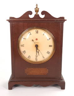 TELECHRON ELECTRIC WOOD CASE MANTEL CLOCK 4H99: CLOCK REMAINS IN GOOD CONDITION WITH LIGHT GENERAL WEAR, HANDS MOVE WHEN PLUGGED IN APPROX. COMBINED DIMENSIONS: 12'' H x 8'' W x 4'' D