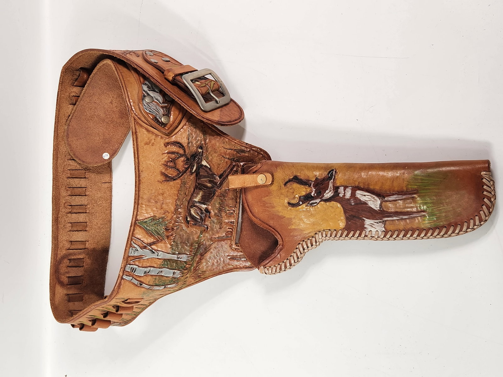 LEATHER BELT GUN HOLSTER WITH NATURE SCENE: TOOLED & PAINTED LEATHER BELT HOLSTER REMAINS IN GOOD CONDITION WITH VARIOUS NORTH AMERICAN GAME