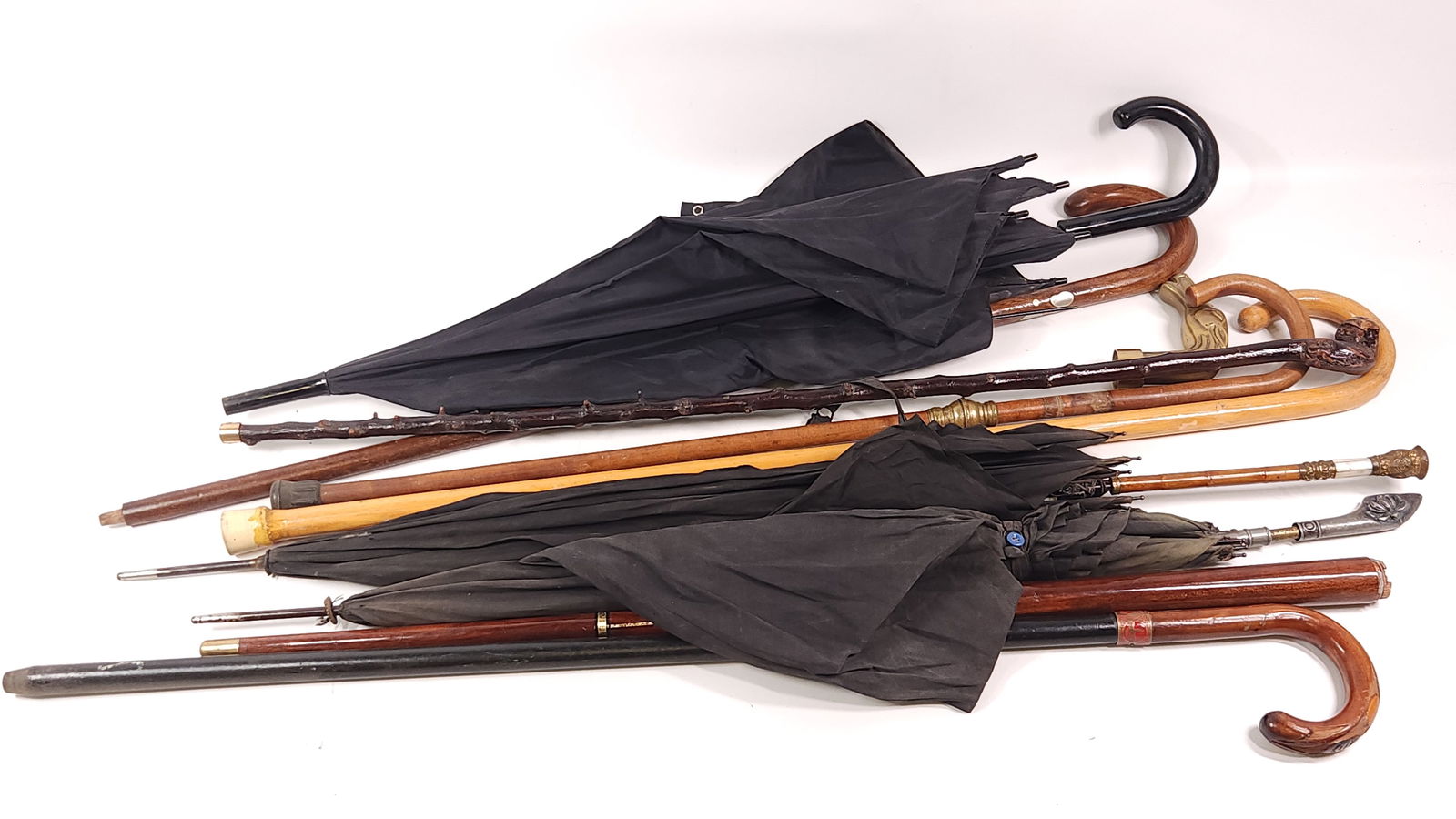 LOT OF UMBRELLAS & CANES (1 of 6)