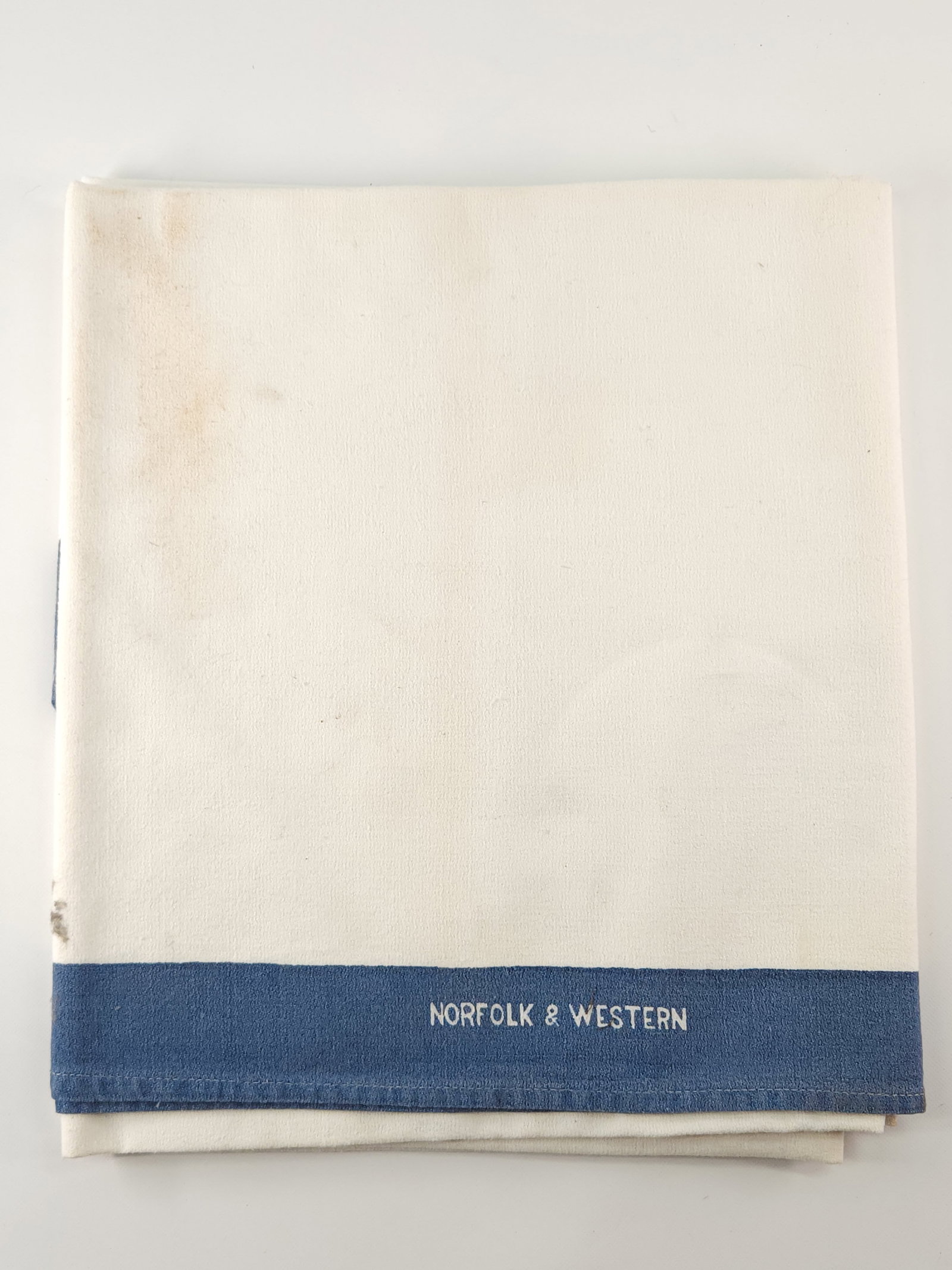 NORFOLK & WESTERN RAILWAY TABLECLOTH: REMAINS IN GOOD CONDITION, SHOWING SOME LIGHT STAINING.