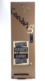 VINTAGE HERSHEY CANDY BAR 5 CENT VENDING MACHINE: REMAINS IN GOOD CONDITION, SHOWING SOME TYPICAL WEAR.
