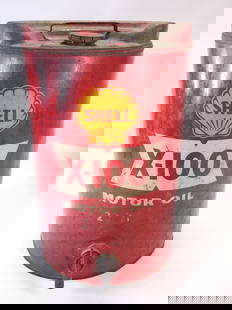 SHELL X-100 5 GALLON MOTOR OIL CAN W/ SPOUT: REMAINS IN FAIR TO GOOD USED CONDITION, SHOWING SOME TYPICAL WEAR.