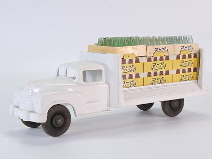 VINTAGE MARX PLASTIC & TIN LITHO DELIVERY TRUCK: REMAINS IN GOOD CONDITION, SHOWING SOME TYPICAL WEAR.