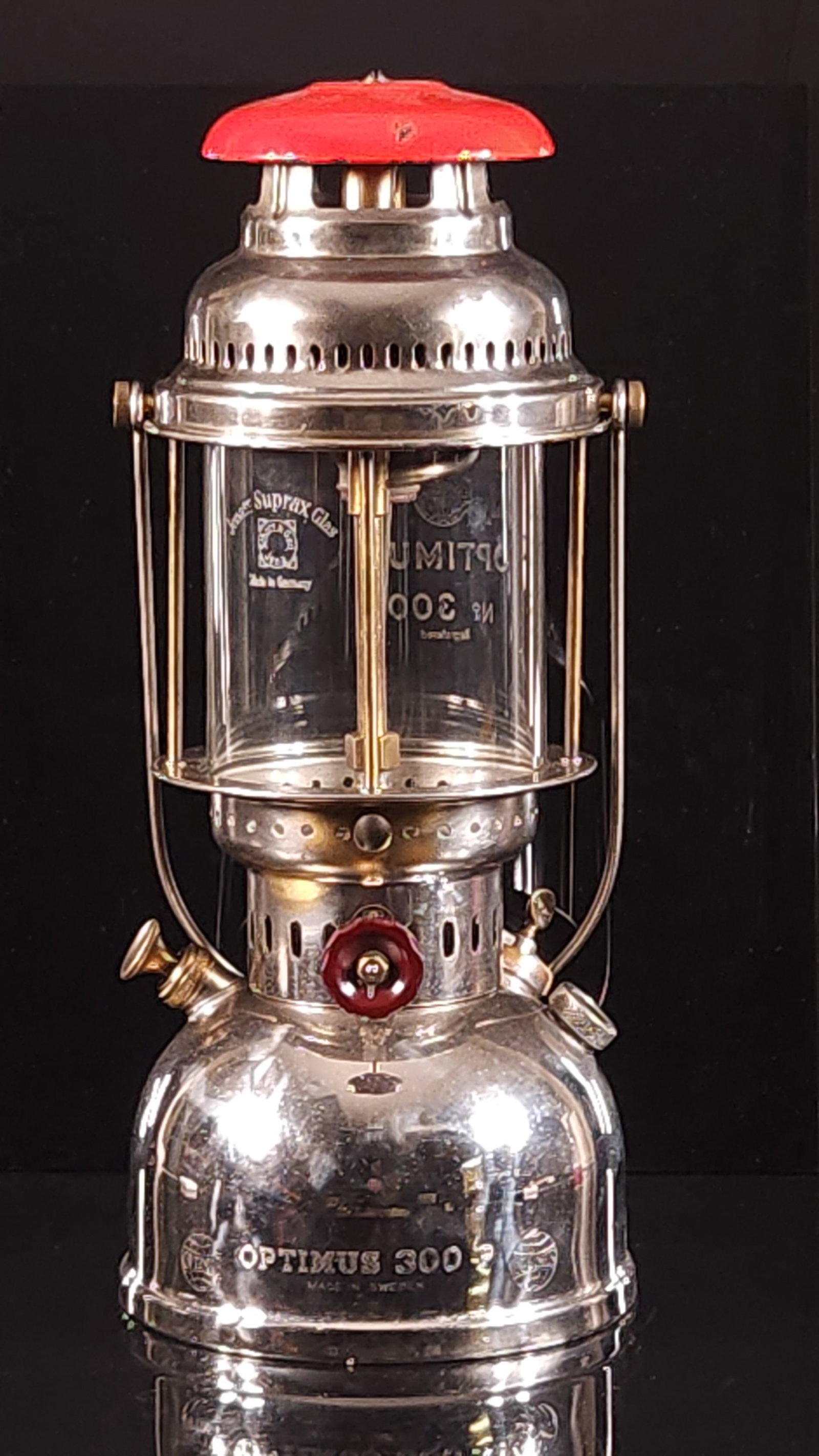 LARGE SWEDEN OPTIMUS 300 LANTERN: REMAINS IN GOOD CONDITION, SHOWING SOME TYPICAL USAGE WEAR. DUSTY, NEEDS CLEANED. 15 INCHES TALL.