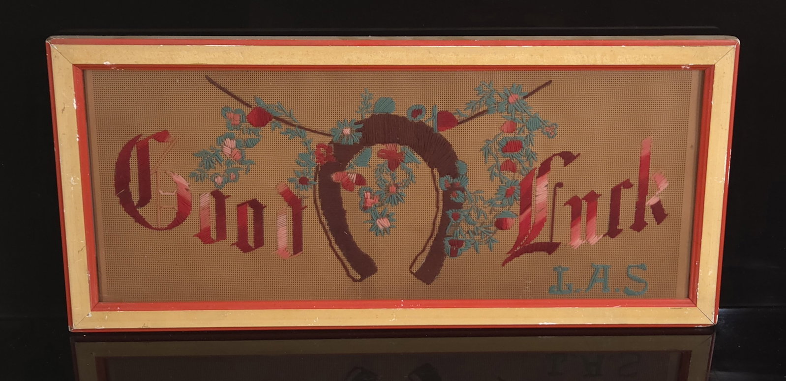 GOOD LUCK L.A.S. FRAMED NEEDLEWORK: REMAINS IN GOOD CONDITION, SHOWING SOME TYPICAL WEAR.