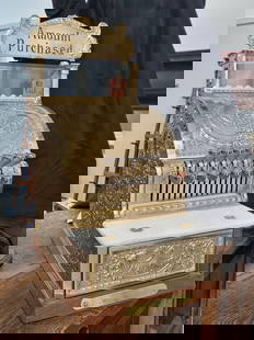 RESTORED BRASS NATIONAL CASH REGISTER MODEL 313: REMAINS IN EXCELLENT CONDITION WITH KEY. STANDS APPROXIMATELY 20" TALL BY 9 3/4" WIDE BY 15" DEEP.