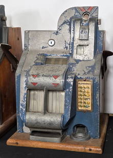 MILLS NOVELTY CO 5 CENT SLOT MACHINE: REMAINS IN FAIR CONDITION, SHOWING WEAR THROUGHOUT FOR PARTS OR REPAIR. MEASURES APPROXIMATELY 14" TALL BY 12" WIDE BY 12" DEEP.