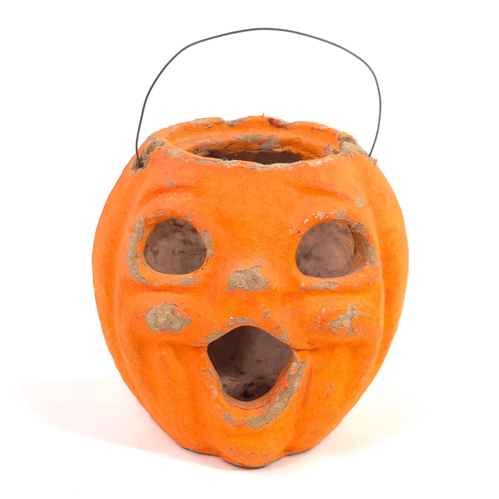 PULP PAPER HALLOWEEN JOL PUMPKIN: REMAINS IN FAIR TO GOOD CONDITION, SHOWING SOME TYPICAL WEAR.