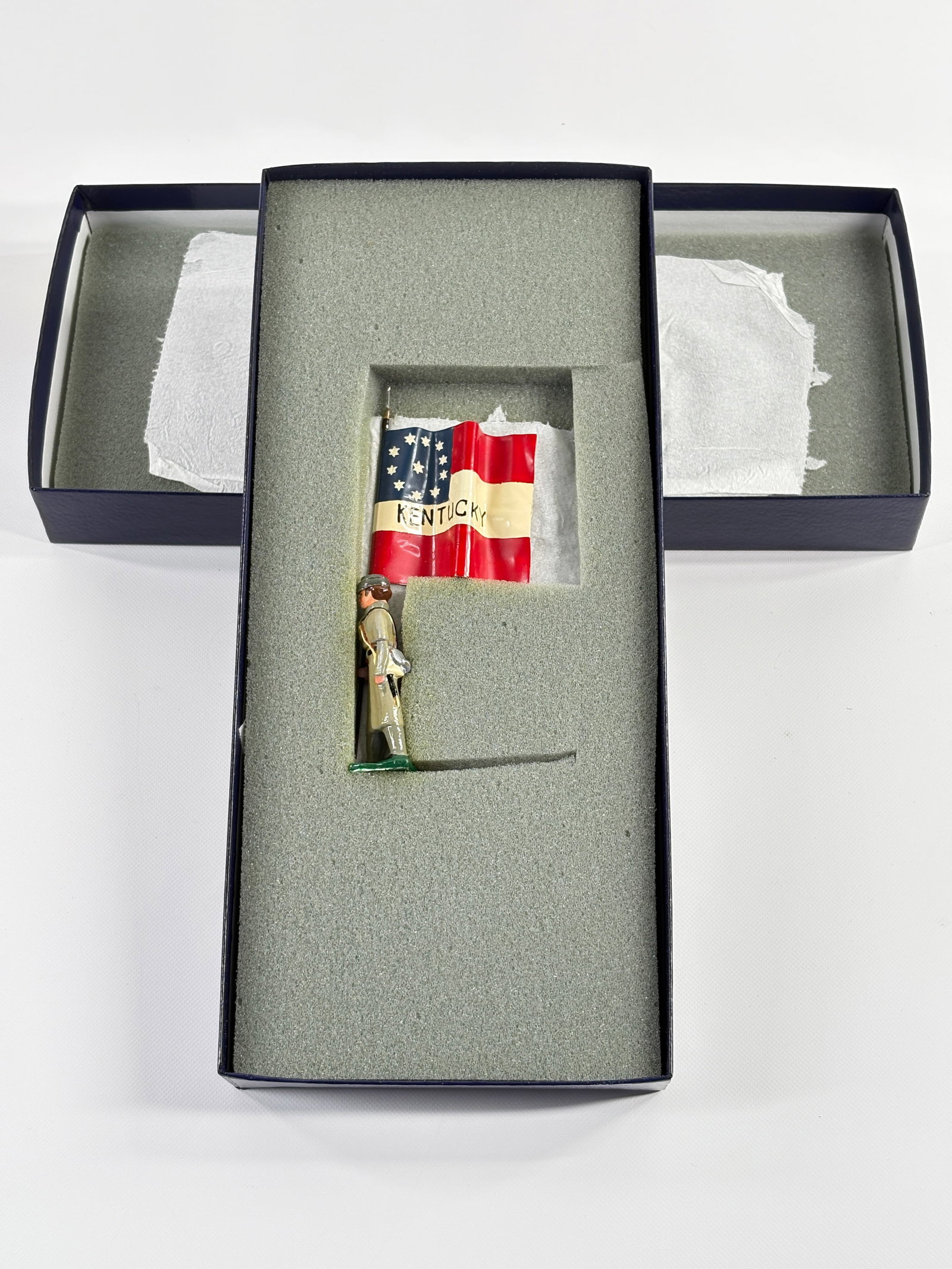 EDMUNDS 1ST KENTUCKY INFANTRY WINTER FLAG: REMAINS IN VERY GOOD CONDITION, SHOWING SOME WEAR FROM INSERT, NEED WIPED DOWN. BOX SHOWING SOME WEAR.