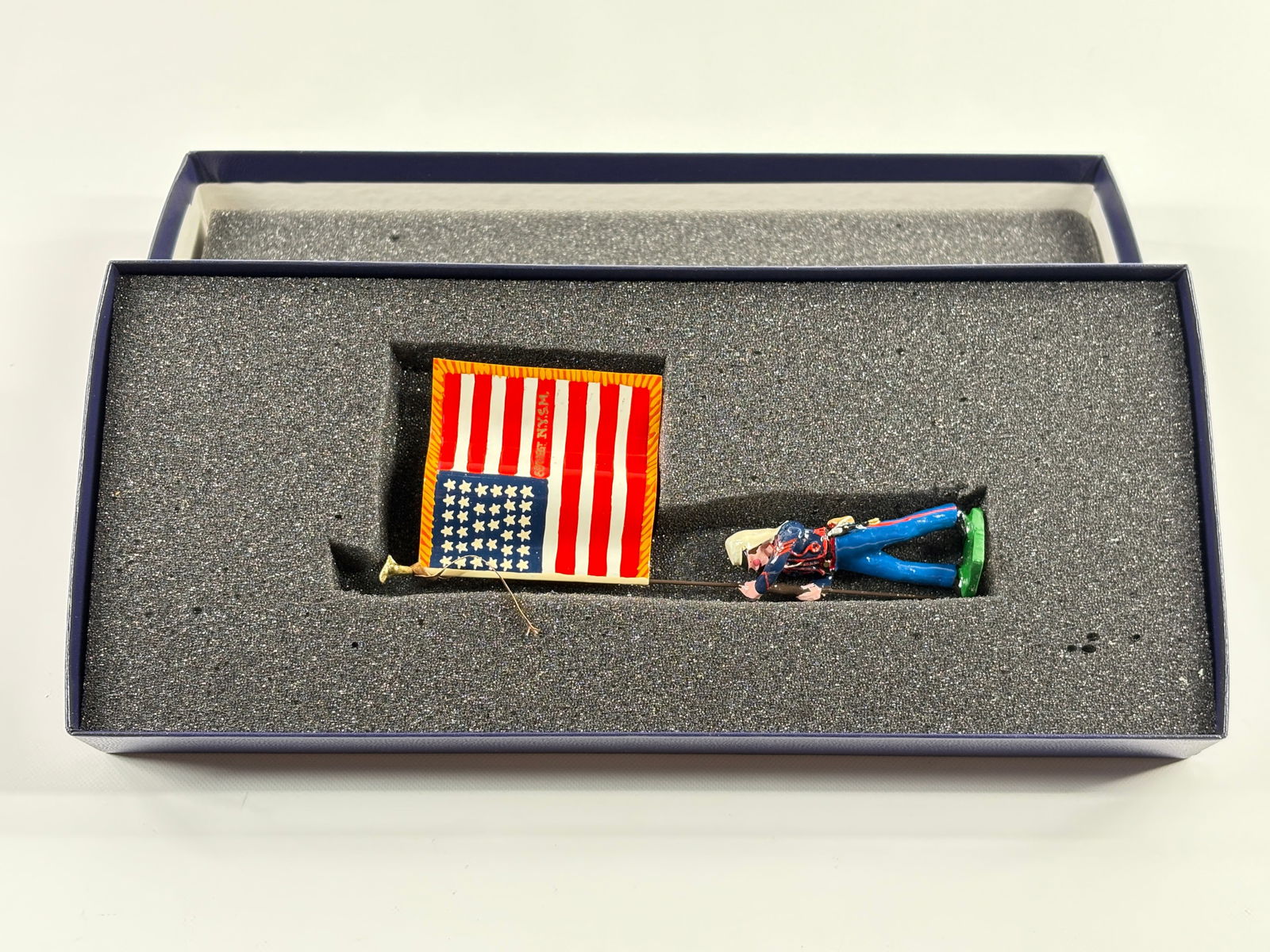 EDMUNDS 69TH NEW YORK INFANTRY NATIONAL FLAG: REMAINS IN VERY GOOD CONDITION, SHOWING SOME WEAR FROM INSERT, NEED WIPED DOWN. BOX SHOWING SOME WEAR.