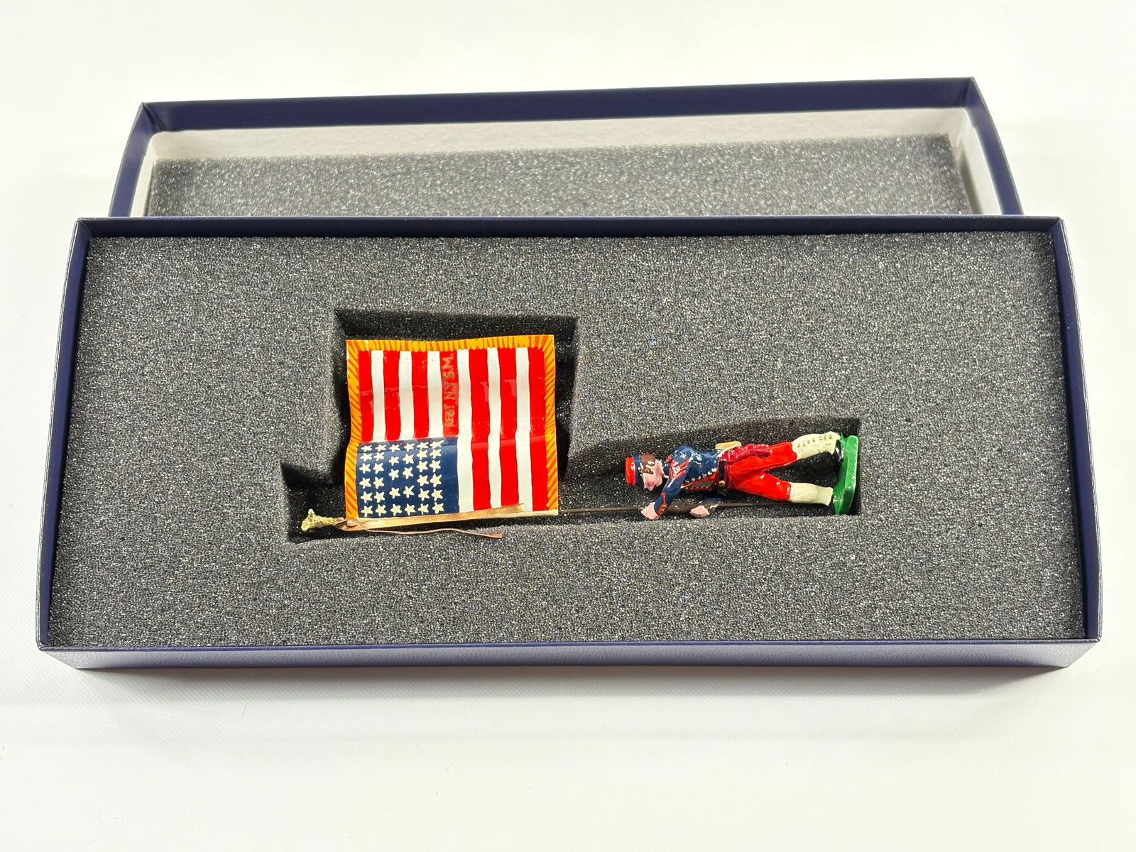 EDMUNDS 14TH NEW YORK MILITIA NATIONAL FLAG: REMAINS IN VERY GOOD CONDITION, SHOWING SOME WEAR FROM INSERT, NEED WIPED DOWN. BOX SHOWING SOME WEAR.