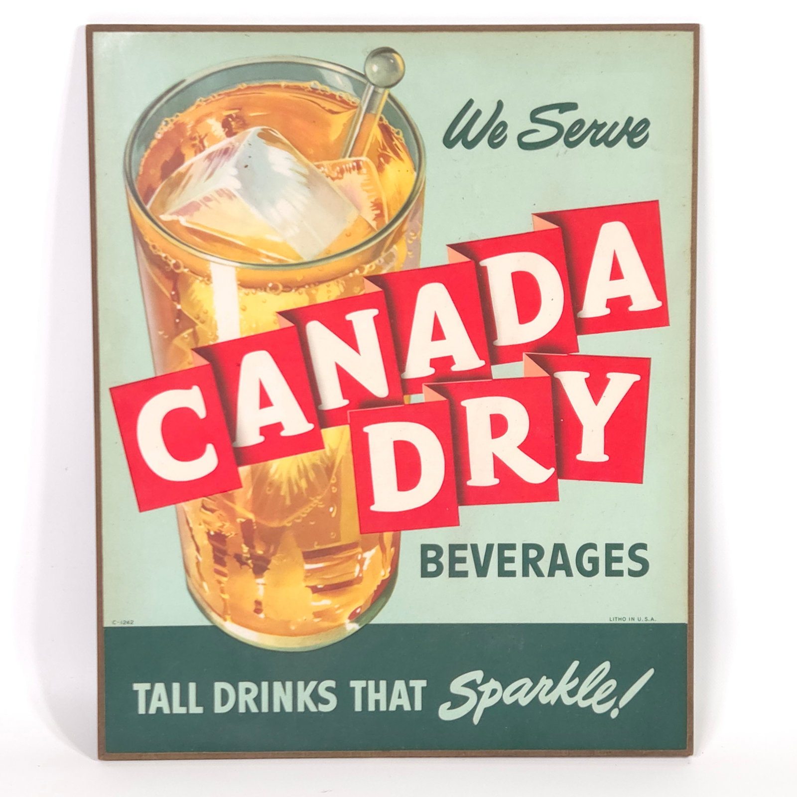 VINTAGE CANADA DRY MASONITE ADVERTISING SIGN: REMAINS IN VERY GOOD CONDITION, SHOWING ONLY SOME TYPICAL WEAR.
