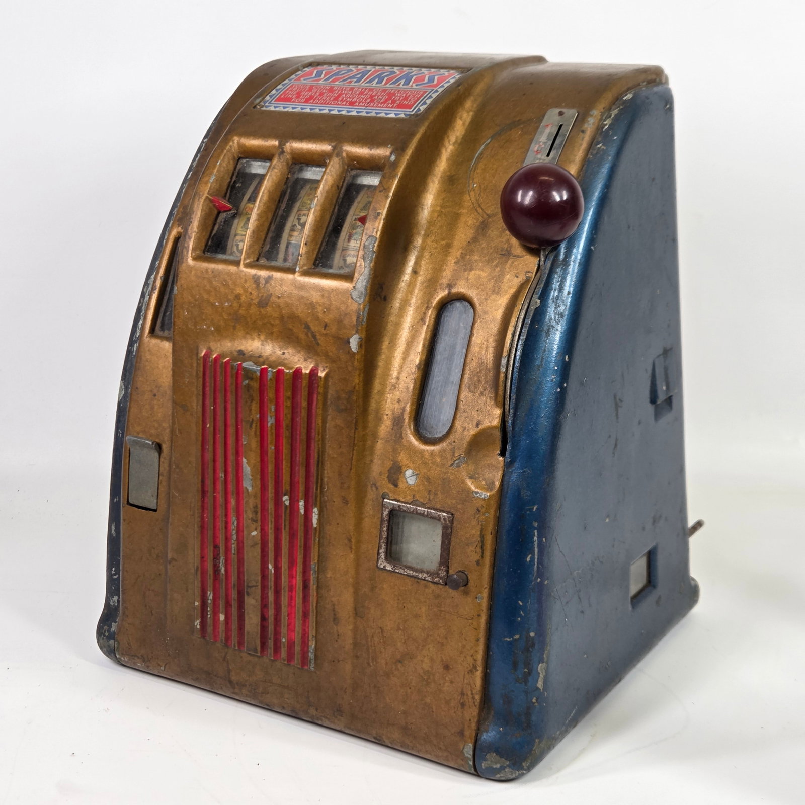 ANTIQUE SPARKS COIN OP GUMBALL CIGARETTE TRADE STIMULATOR: REMAINS IN GOOD USED CONDITION, SHOWING WEAR THROUGHOUT. UNSURE IF COMPLETE. UNTESTED.
