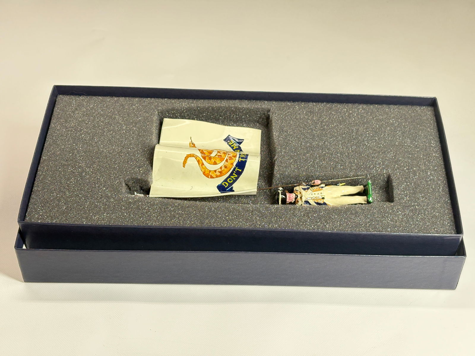 EDMUNDS 1ST CONTINENTAL REGT. 1776 FLAG: REMAINS IN VERY GOOD CONDITION, SHOWING SOME WEAR FROM INSERT, NEED WIPED DOWN. BOX SHOWING SOME WEAR.