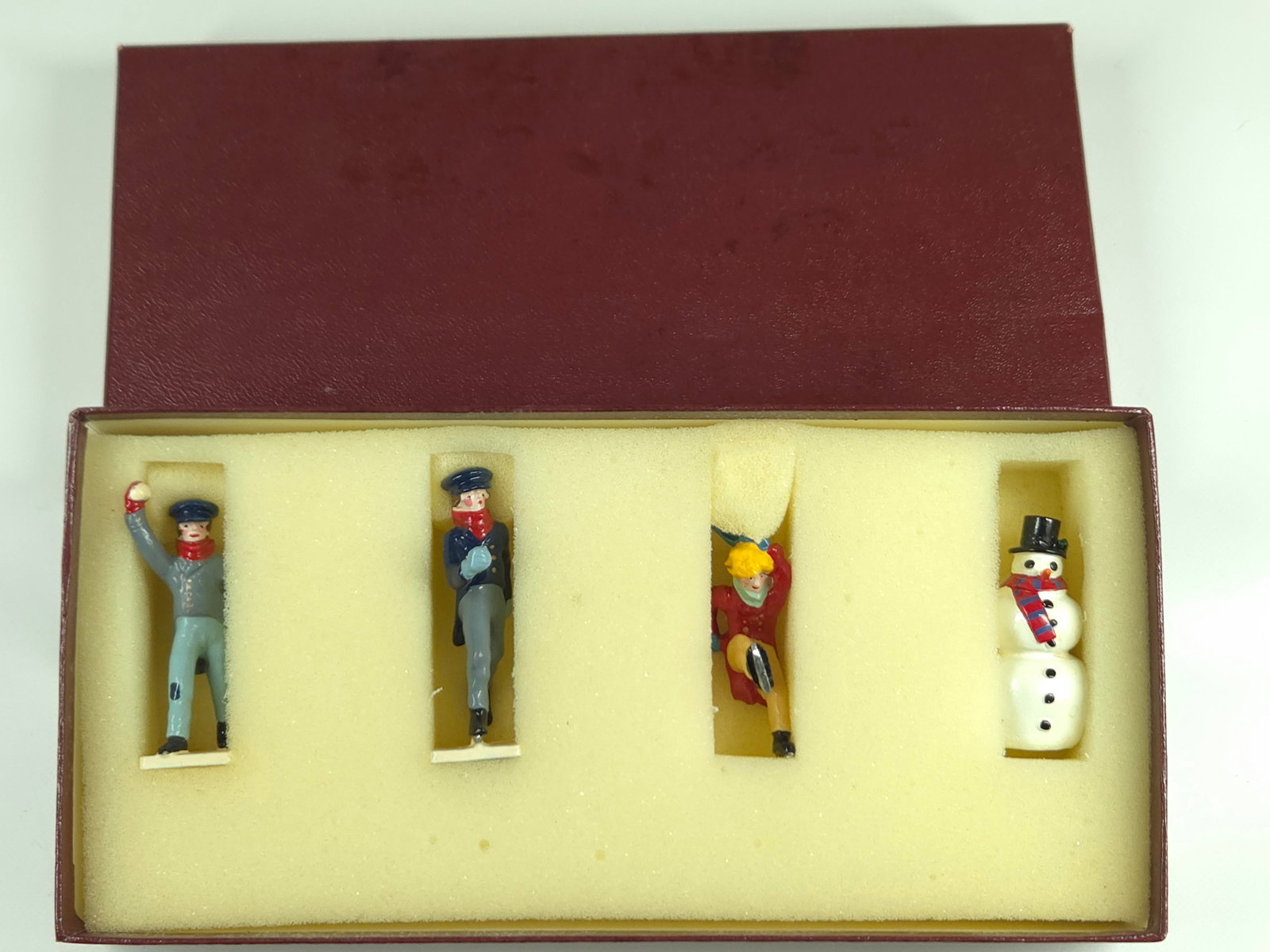 STEADFAST SF92 LEAD SNOWMAN & BOY SKATERS: REMAINS IN VERY GOOD CONDITION, SHOWING ONLY SOME TYPICAL WEAR.