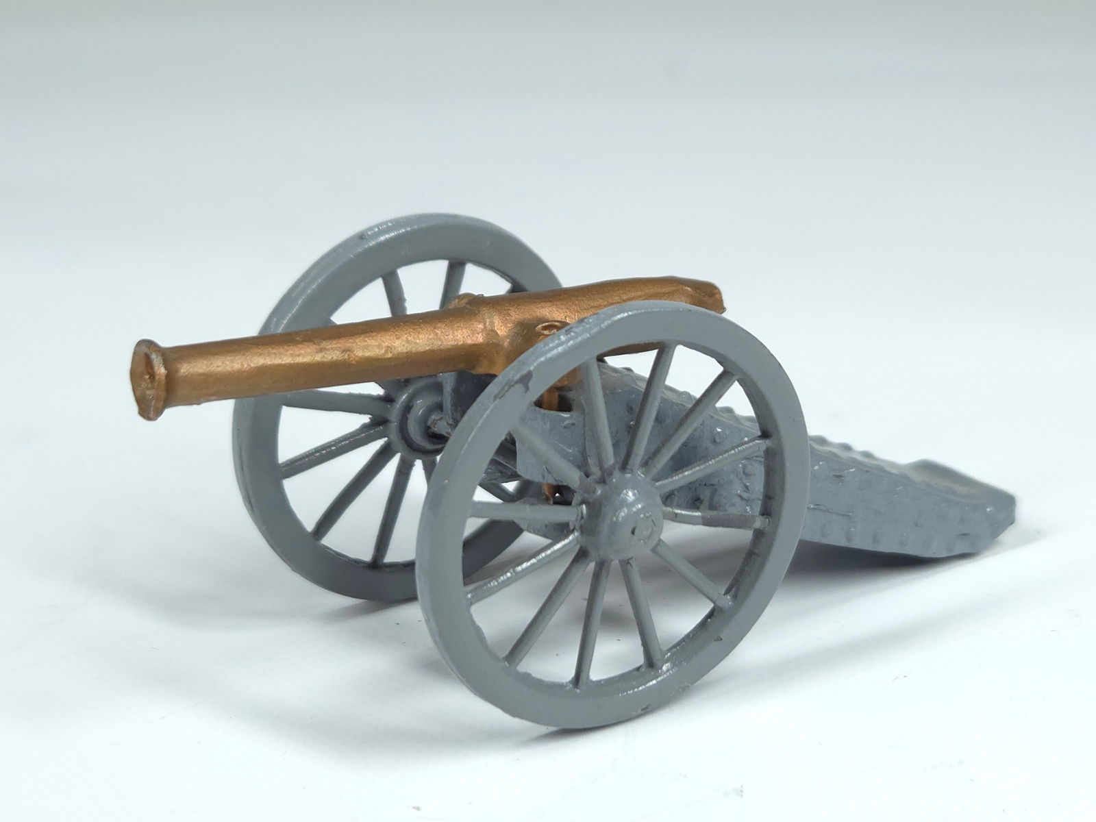 UNMARKED CAST LEAD TOY CANNON: REMAINS IN VERY GOOD CONDITION, SHOWING ONLY SOME TYPICAL WEAR.