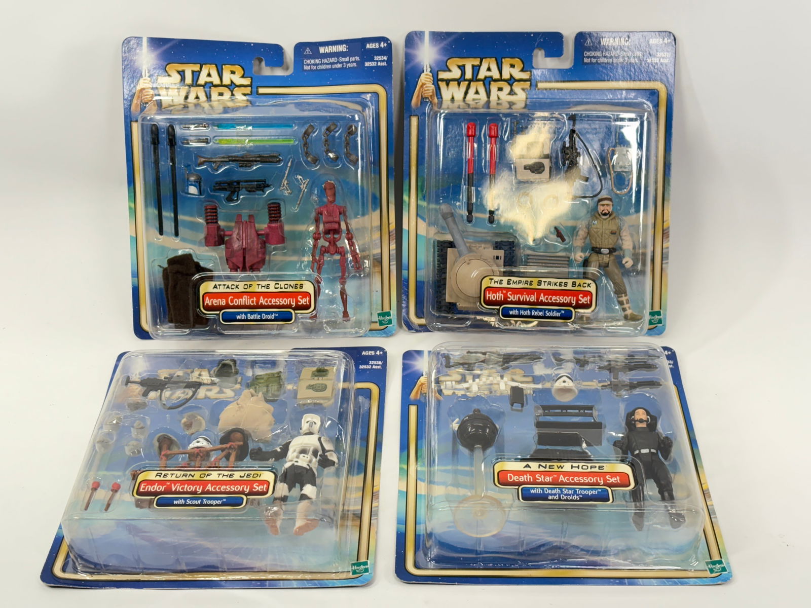 4) STAR WARS ACTION FIGURES NIP: ALL REMAIN NEW IN PACKAGE.