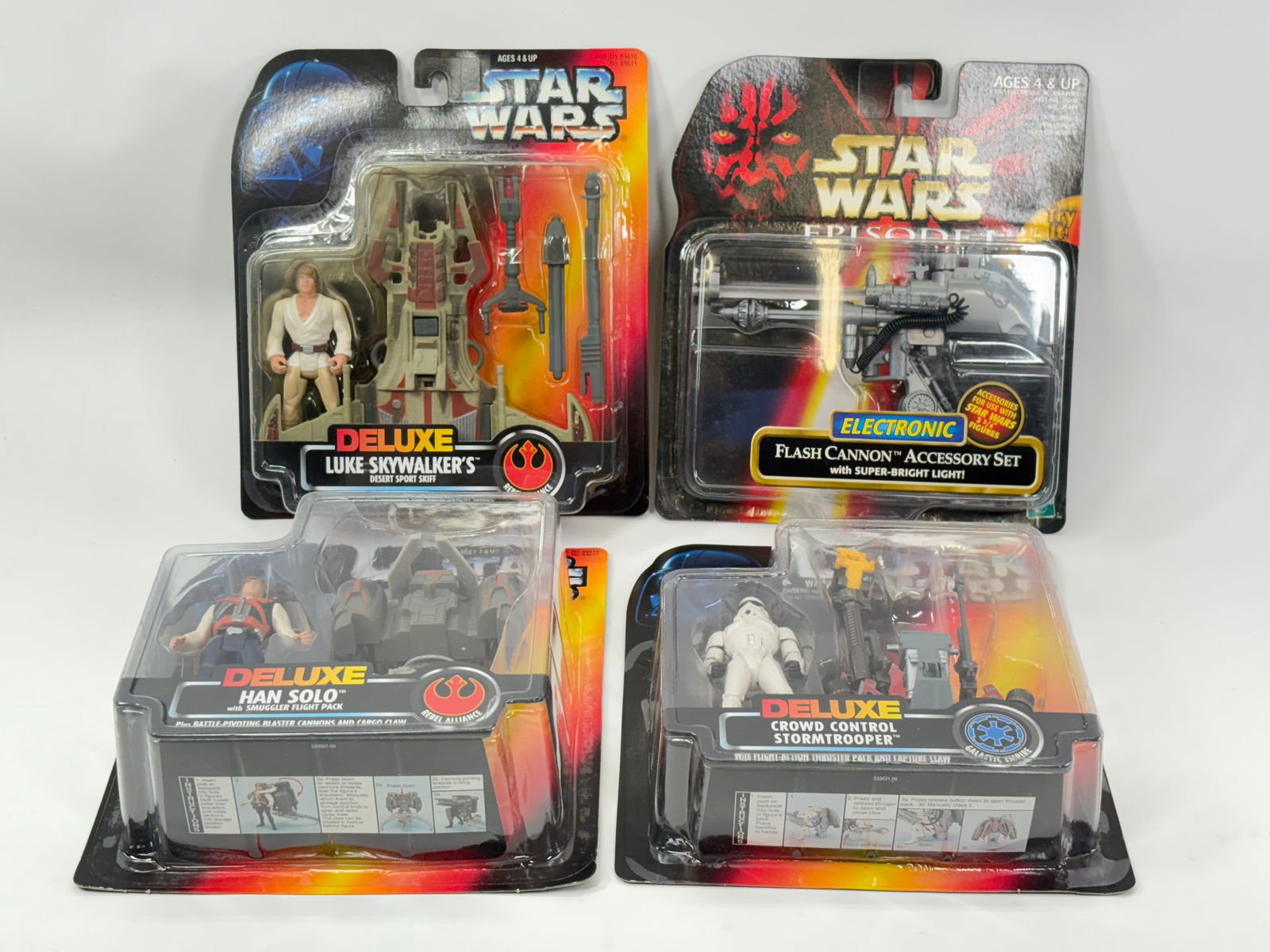 4) STAR WARS ACTION FIGURES NIP: ALL REMAIN NEW IN PACKAGE.