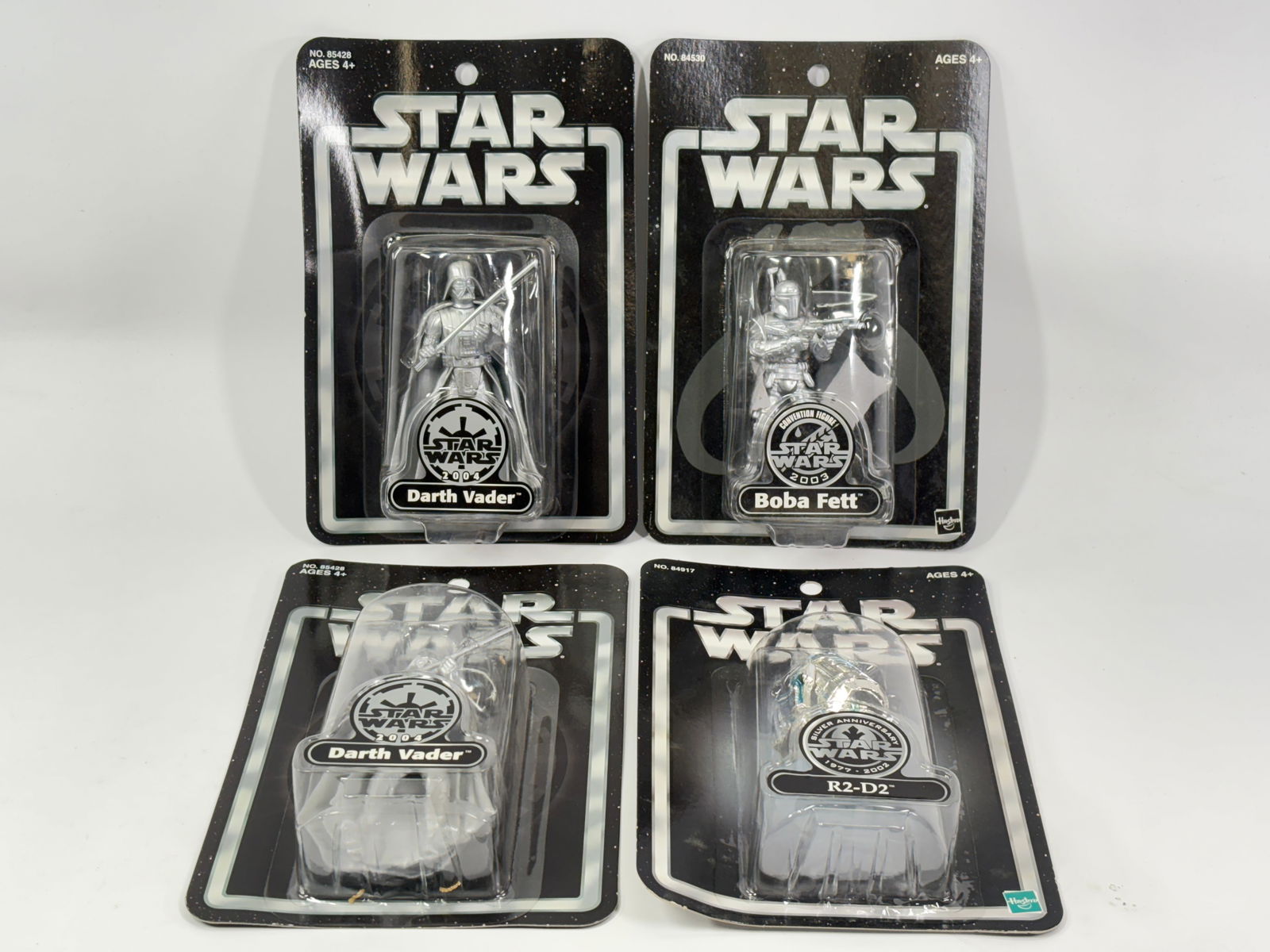 4) STAR WARS SILVER ANNIVERSARY FIGURES NIP: ALL REMAIN NEW IN PACKAGE.