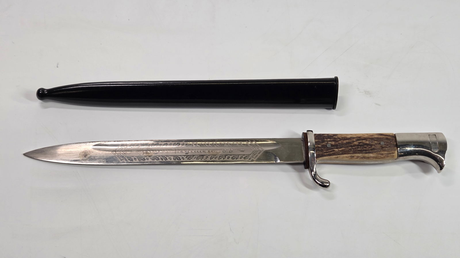 GERMAN WWII K98 DRESS BAYONET: REMAINS IN GOOD CONDITION, SHOWING ONLY SOME TYPICAL WEAR.