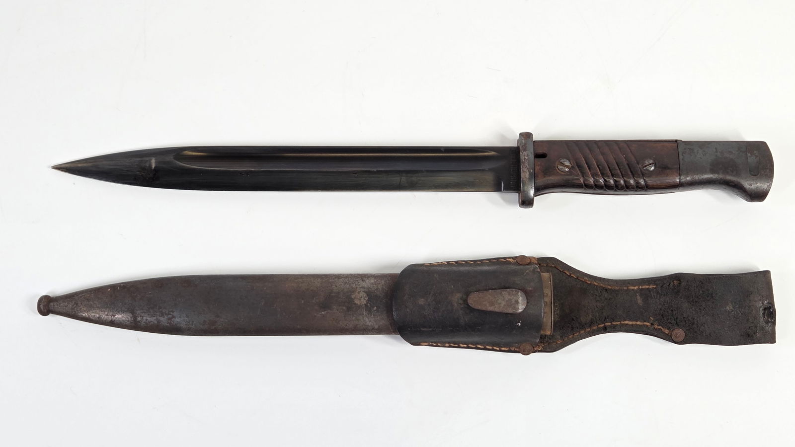 WWII GERMAN K98 MAUSER RIFLE BAYONET W/ SCABBARD: REMAINS IN GOOD CONDITION, SHOWING SOME TYPICAL WEAR.