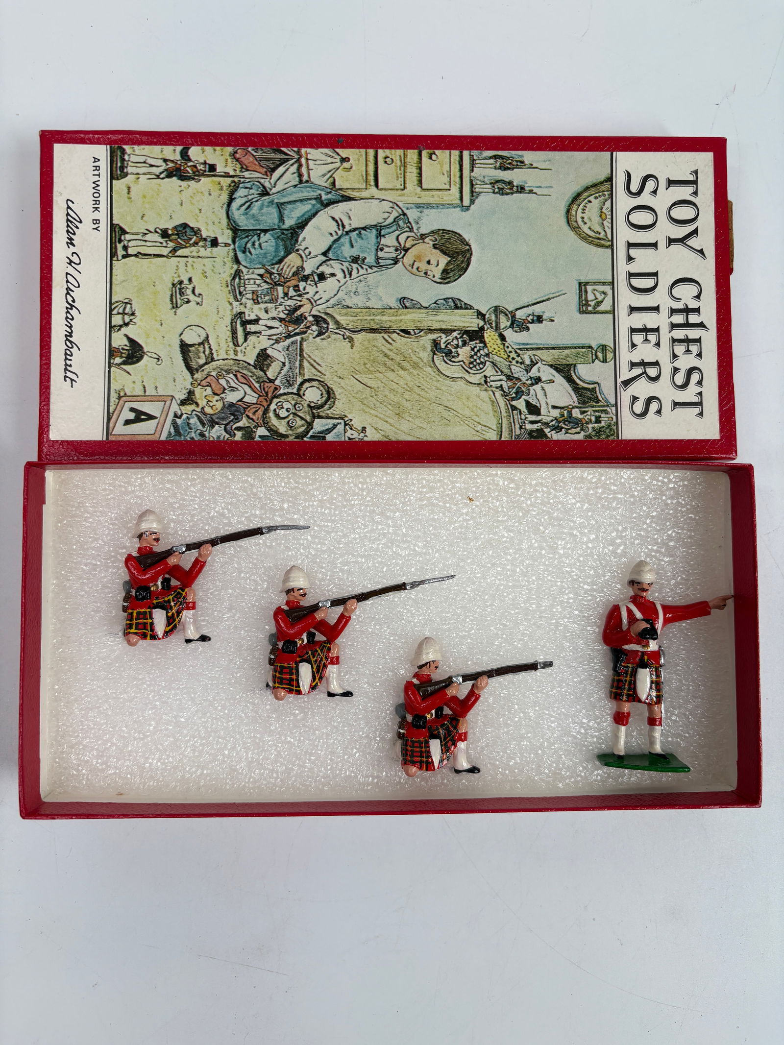 4-PIECE TOY CHEST SOLDIERS SET: ALL REMAIN IN VERY GOOD CONDITION, SHOWING MINIMAL WEAR. BOXES REMAIN IN GOOD CONDITION, SHOWING SOME STORAGE WEAR.