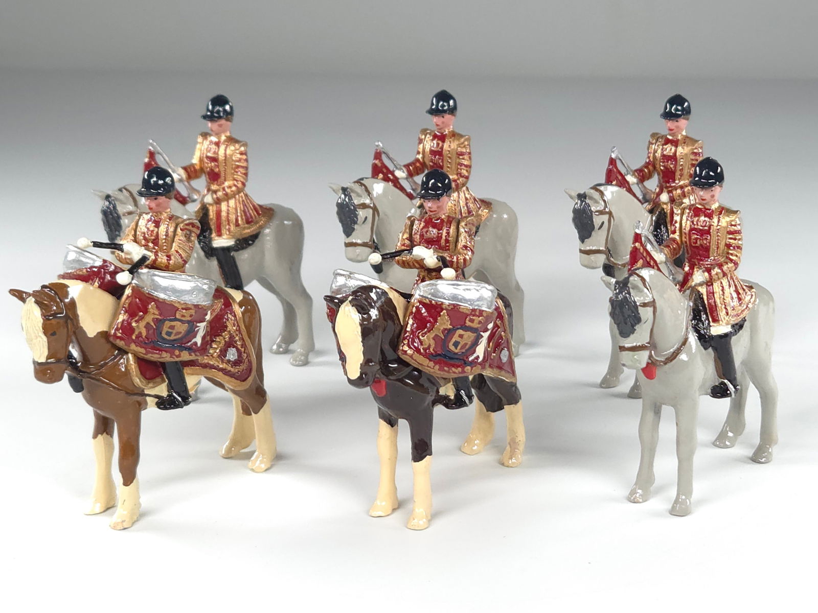 SET OF 6 MOUNTED MILITARY BAND: ALL REMAIN IN VERY GOOD CONDITION, SHOWING MINIMAL WEAR. BOXES REMAIN IN GOOD CONDITION, SHOWING SOME STORAGE WEAR.