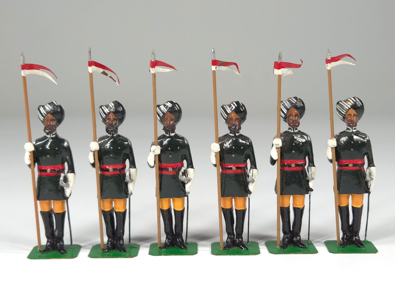 W.C. HAND PAINTED INDIAN LANCERS: ALL REMAIN IN GOOD CONDITION, SHOWING SOME MINIMAL WEAR.