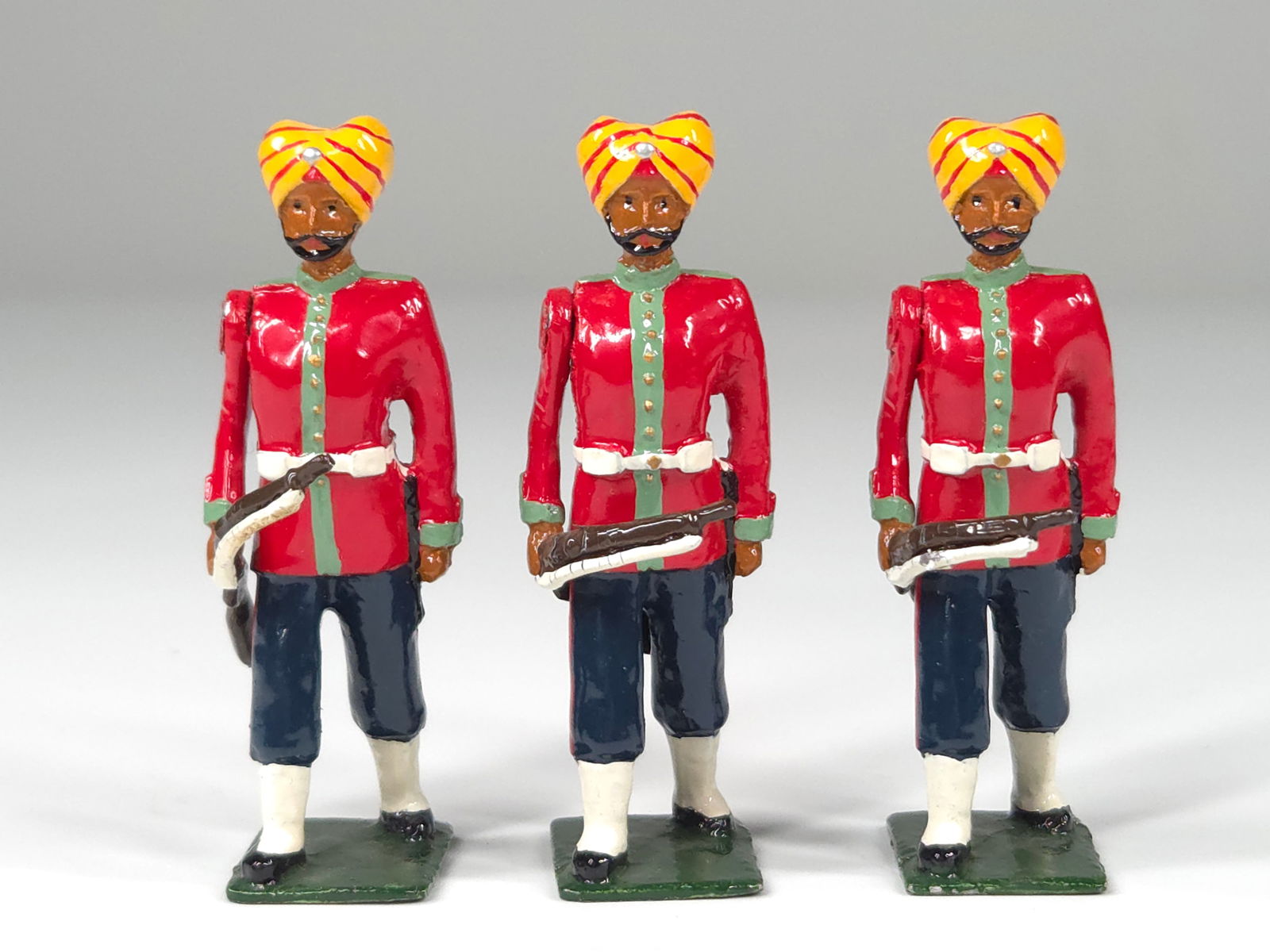 LONDON BRIDGE 15TH LUDHIANA SIKHS 3-PIECE SET: ALL REMAIN IN GOOD CONDITION, SHOWING SOME MINIMAL WEAR. ALL HAVE BENDS IN RIFLES.