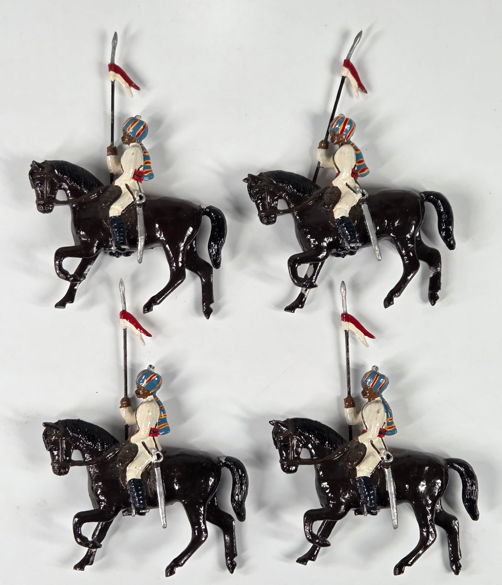 4-PIECE IMPERIAL SERVICE LANCERS: ALL REMAIN IN GOOD CONDITION, SHOWING SOME MINIMAL WEAR.
