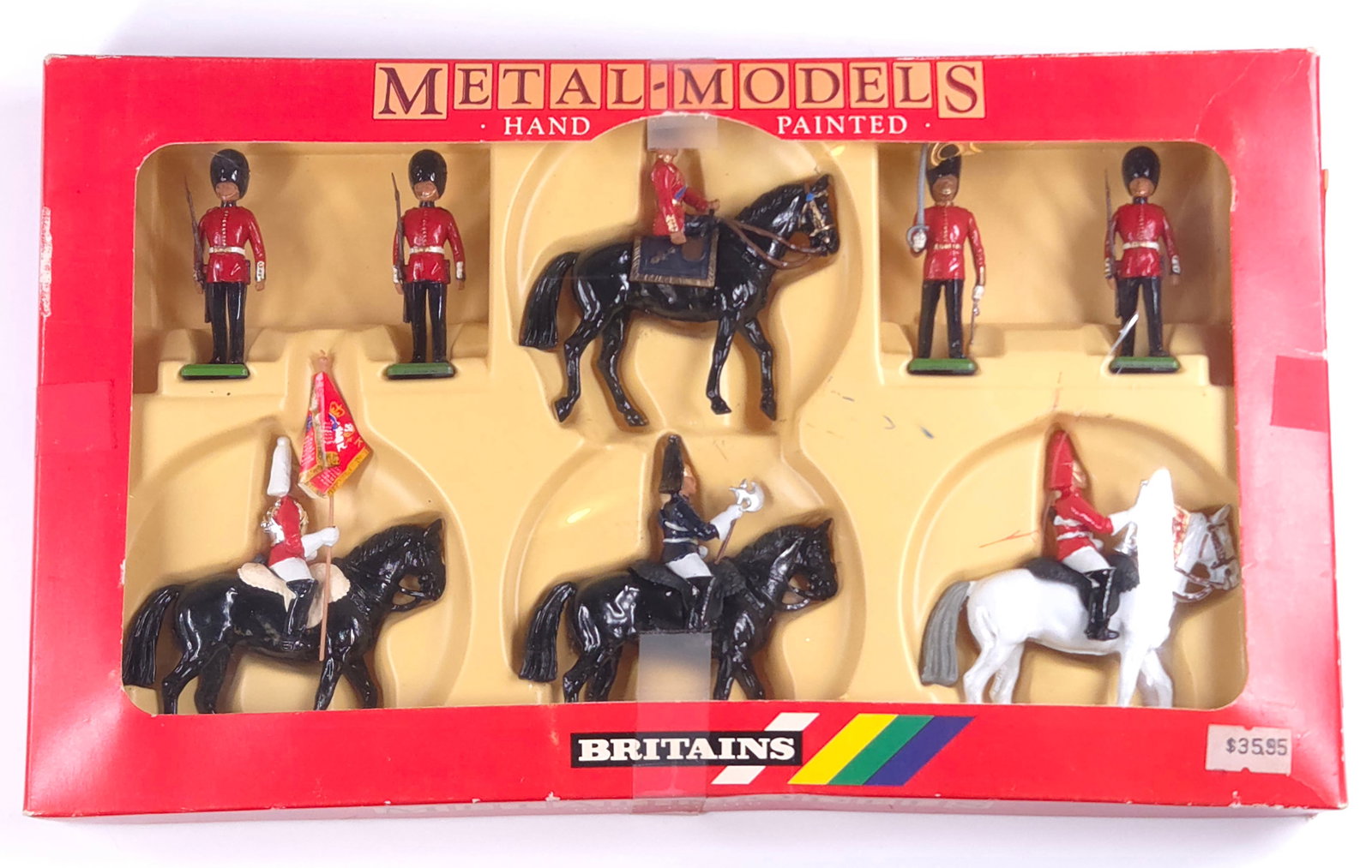 BRITAINS NO. 7218 HER MAJESTY W/ MOUNTED LIFEGUARD & BEARER: REMAINS IN VERY GOOD CONDITION WITH ORIGINAL BOX. BOX SHOWING SOME TYPICAL WEAR.