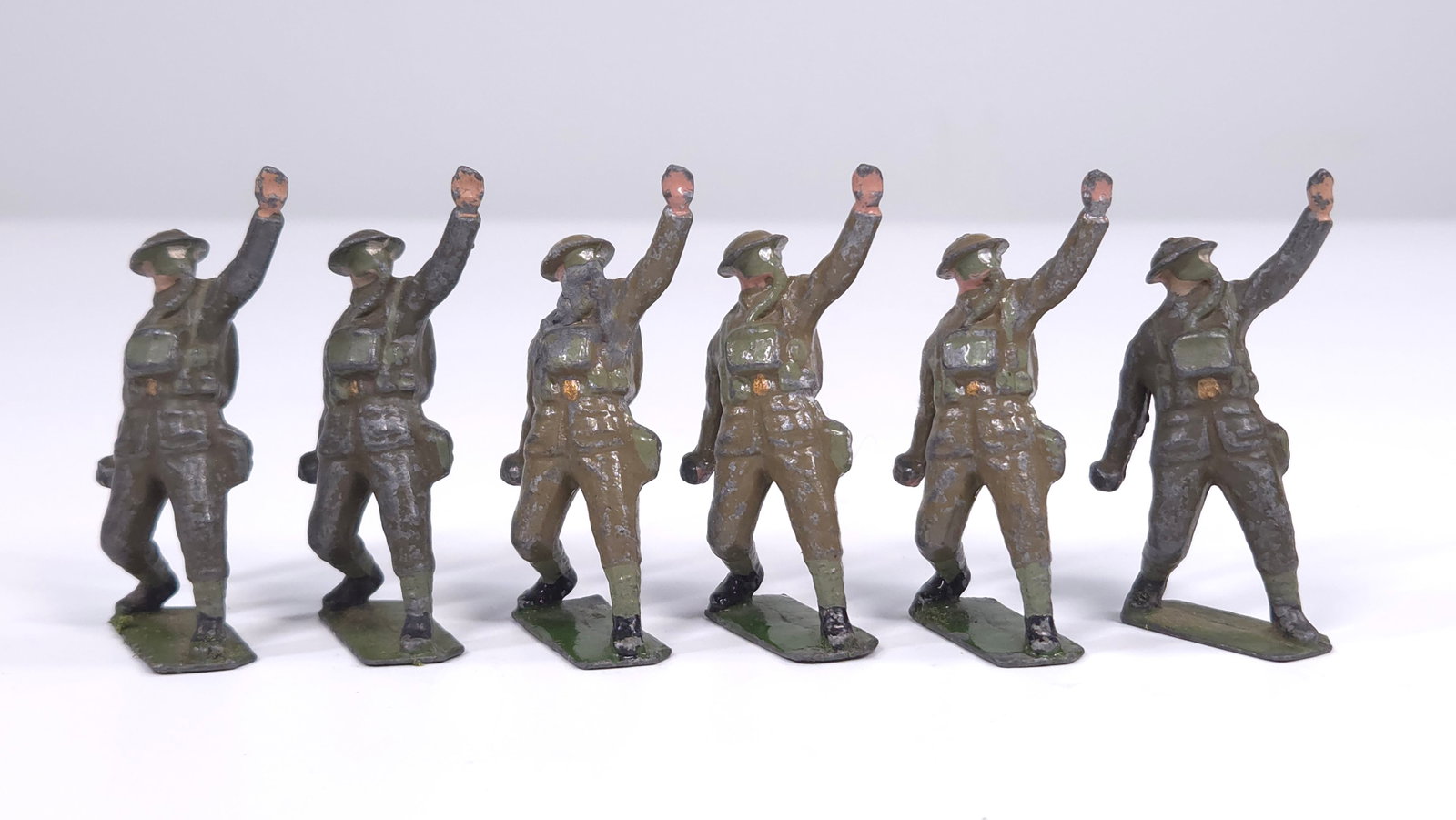 SET OF 6 VINTAGE BRITAIN INFANTRY GAS MASKS: ALL REMAIN IN FAIR CONDITION, SHOWING PAINT WEAR THROUGHOUT. REPLACEMENT BOX AND INSERT.