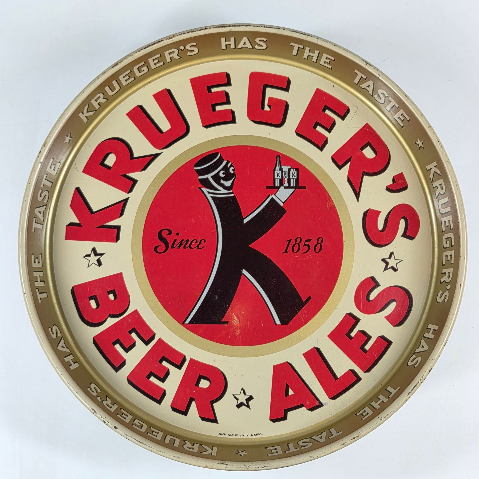 KRUEGER'S HAS THE TASTE ADVERTISING BEER TRAY: REMAINS IN GOOD CONDITION, SHOWING SOME TYPICAL WEAR.