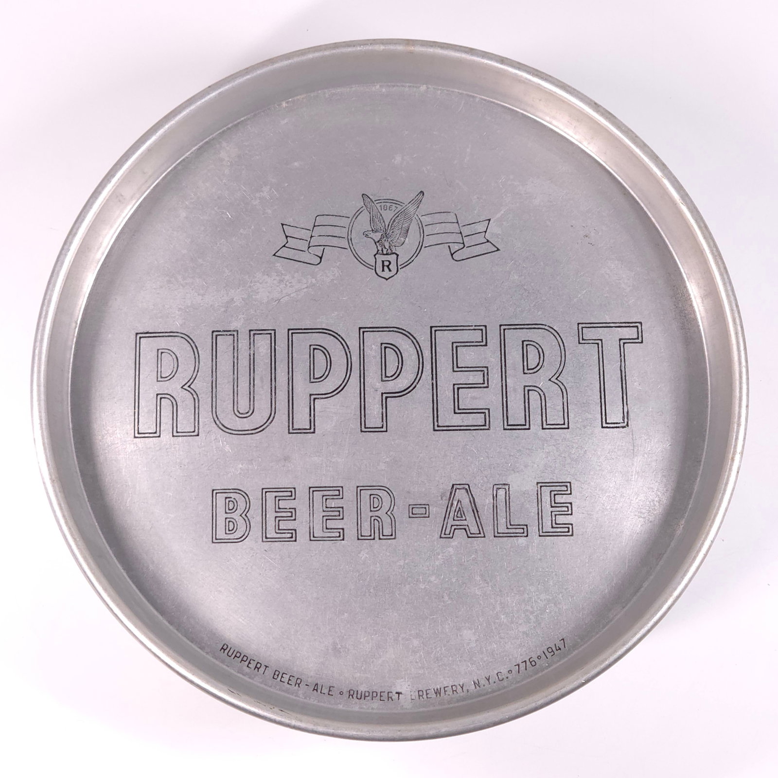 1947 RUPPERT BEER & ALE ADVERTISING TRAY: REMAINS IN GOOD CONDITION, SHOWING SOME TYPICAL WEAR.