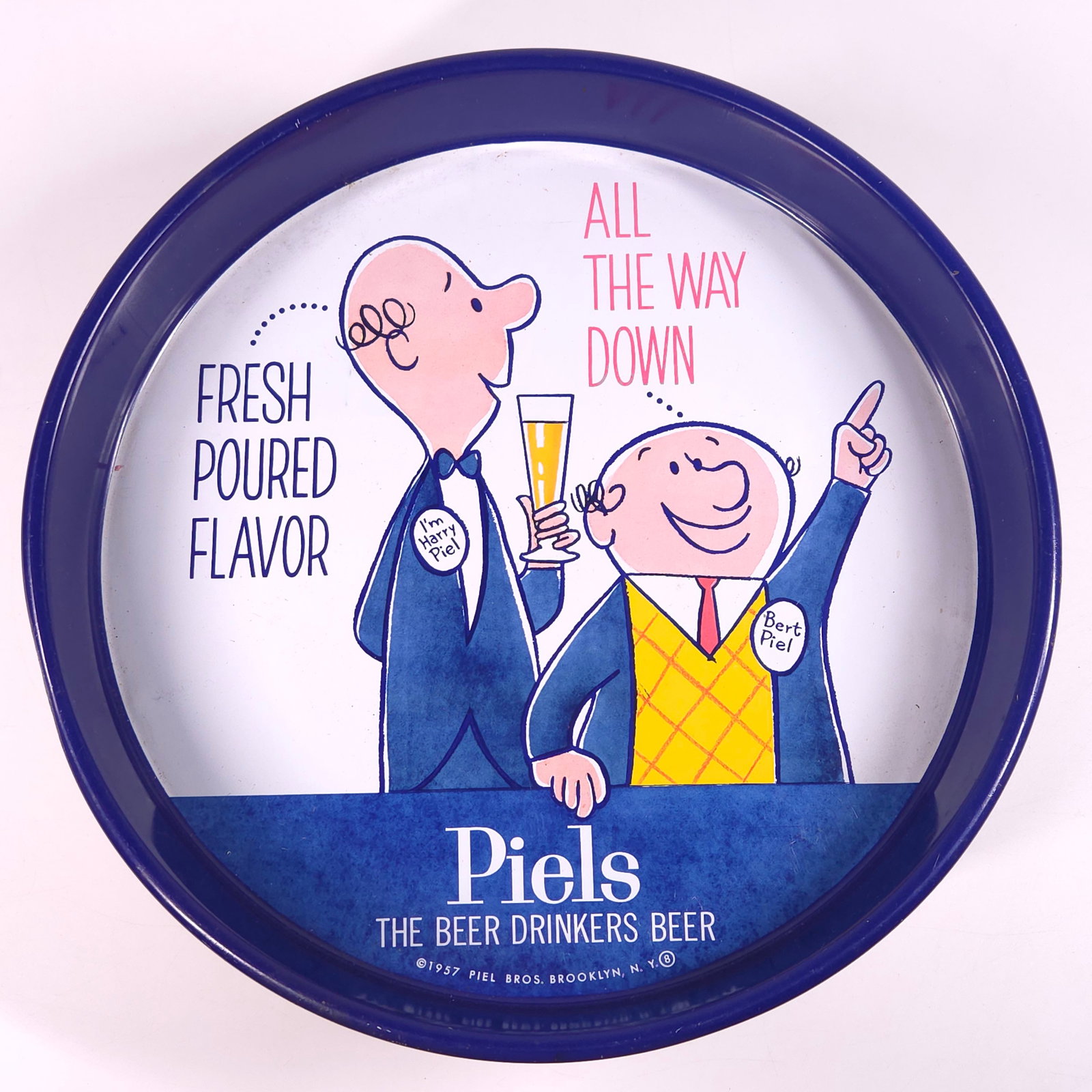 1957 PIELS ADVERTISING BEER TRAY: REMAINS IN GOOD CONDITION, SHOWING SOME TYPICAL WEAR.