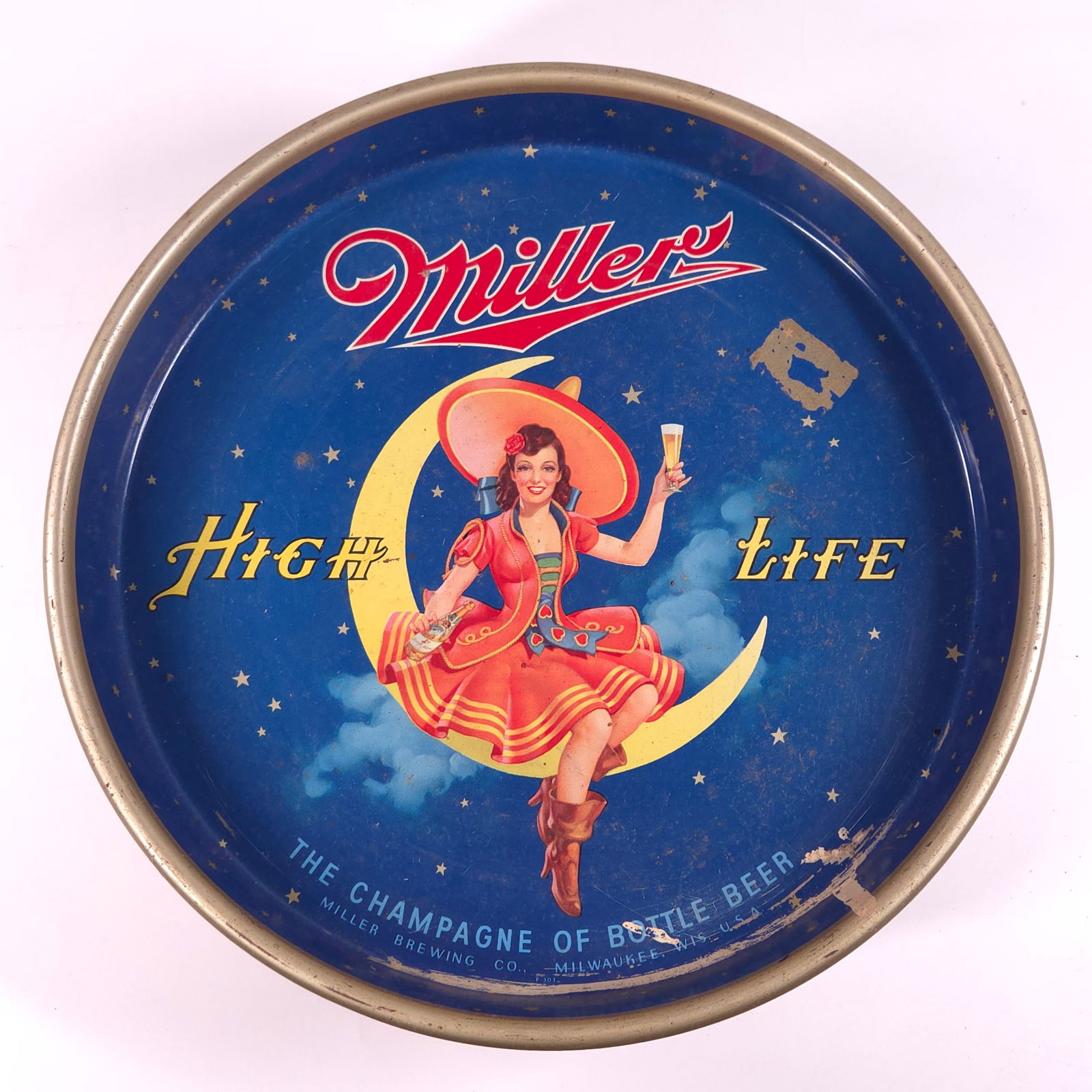 VINTAGE MILLER HIGH LIFE ADVERTISING BEER TRAY: REMAINS IN FAIR TO GOOD CONDITION, SHOWING WEAR AND SCRATCHES THROUGHOUT.