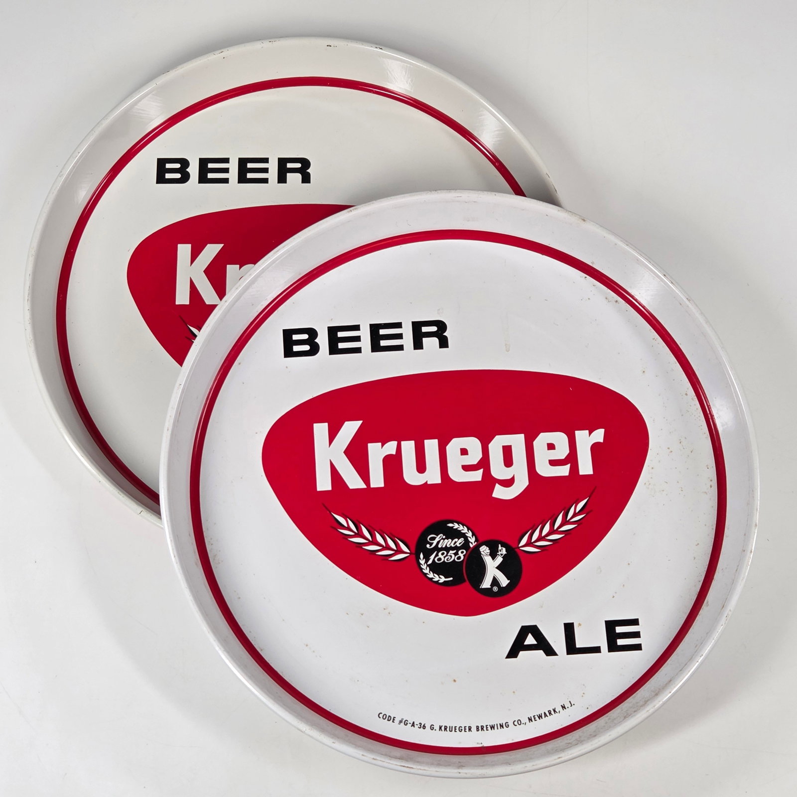 2) G. KRUEGER BEER & ALE ADVERTISING TRAYS: BOTH REMAIN IN VERY GOOD CONDITION.