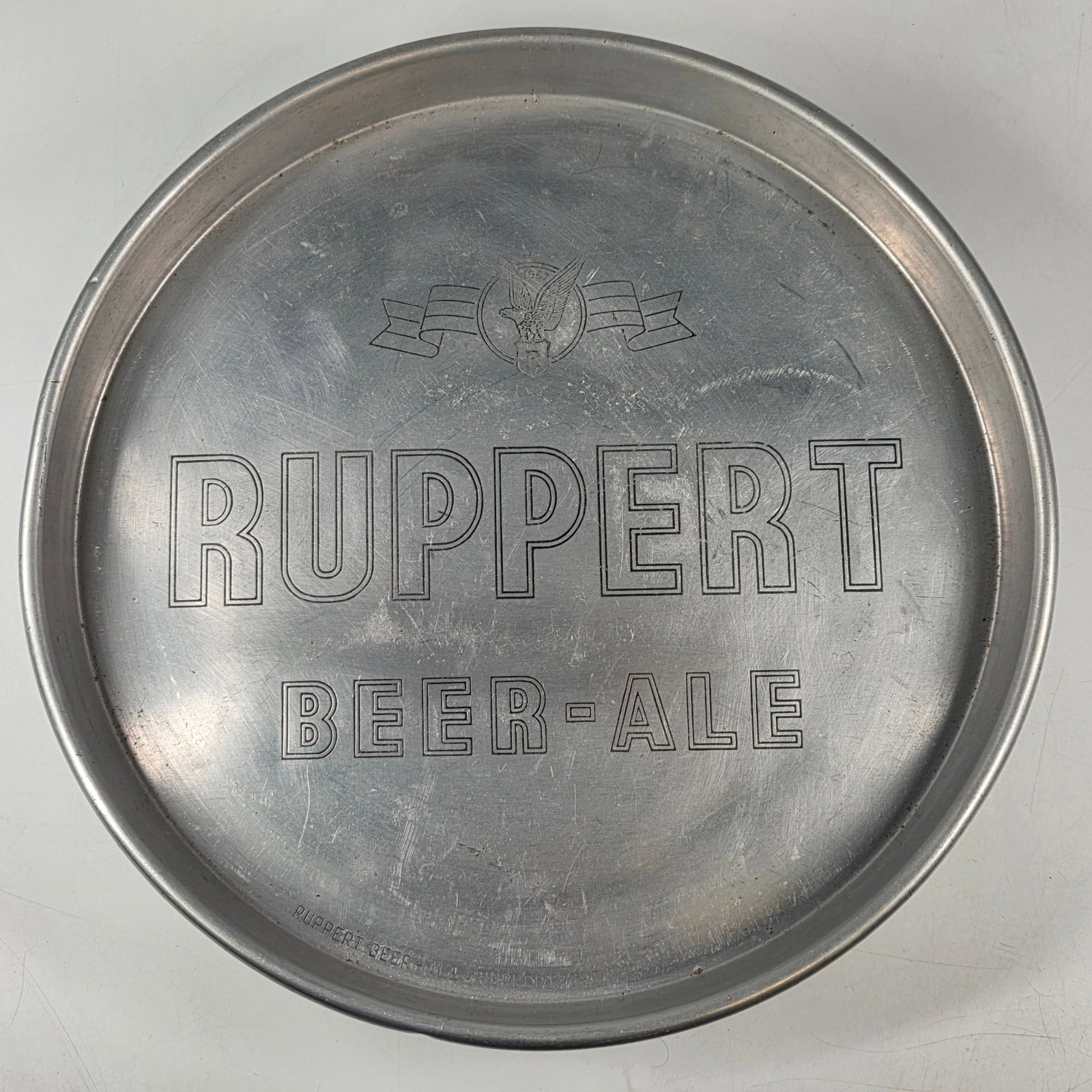 ALUMINUM RUPPERT BEER - ALE ADVERTISING TRAY: REMAINS IN GOOD CONDITION, SHOWING SOME TYPICAL WEAR.