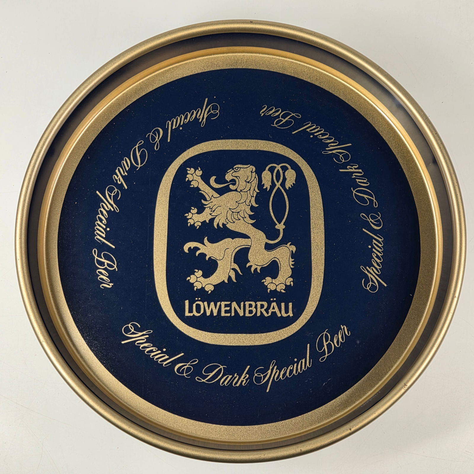 VINTAGE LOWENBRAU ADVERTISING BEER TRAY: REMAINS IN GOOD CONDITION.