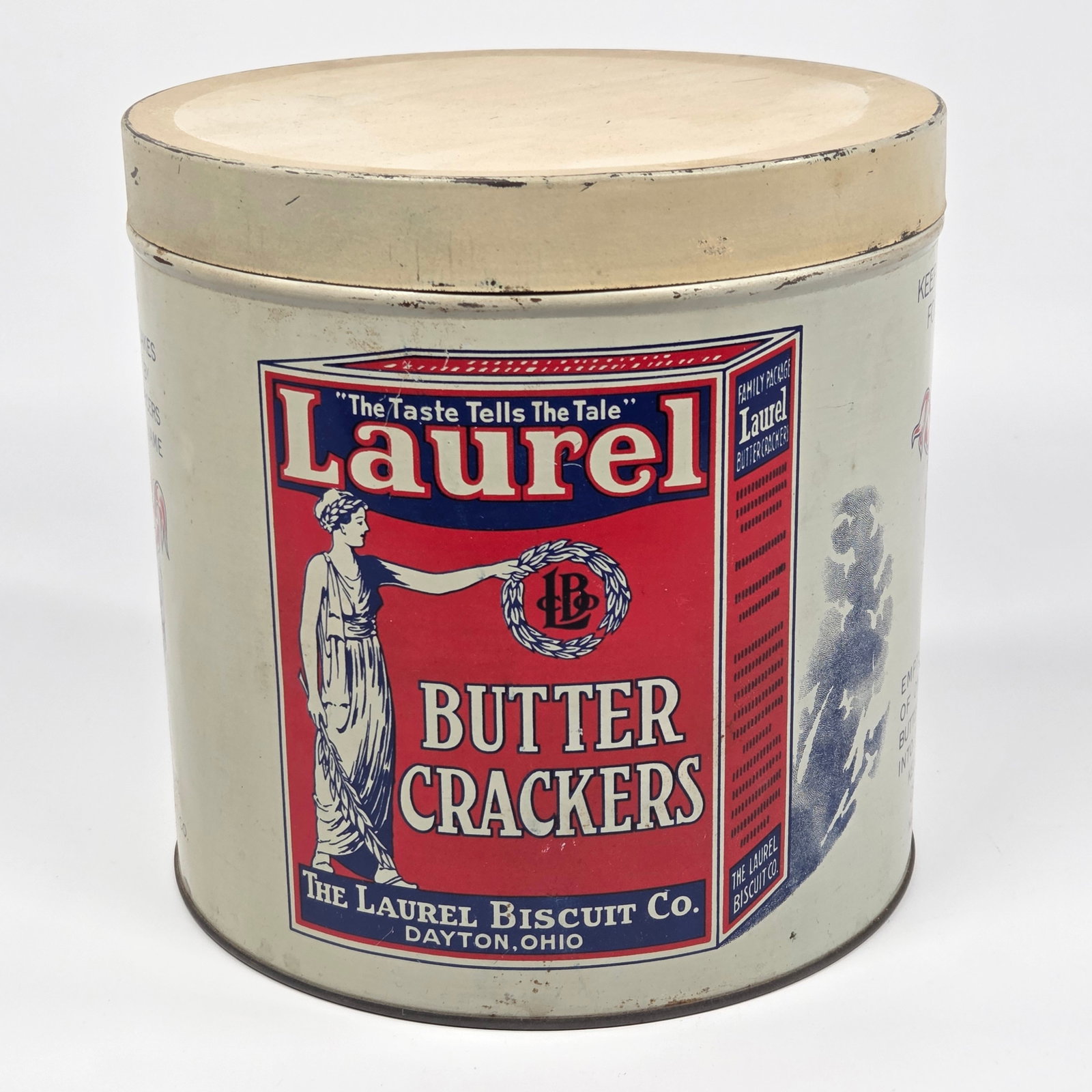 THE LAUREL BISCUIT CO. BUTTER CRACKERS TIN: REMAINS IN GOOD CONDITION, SHOWING SOME TYPICAL WEAR.