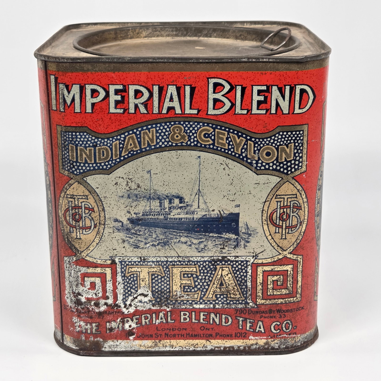 IMPERIAL BLEND TEA CO. INDIAN & CEYLON ADVERTISING TIN: REMAINS IN FAIR TO GOOD CONDITION, SHOWING WEAR.